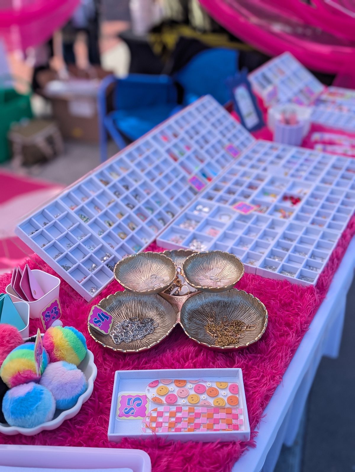 Charm & Moxie charms on display at a maker’s market